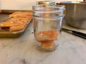 two halves of a biscuit in serving jar