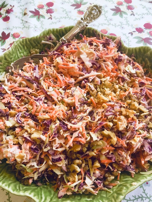 Green bowl with tri-colored blue cheese slaw