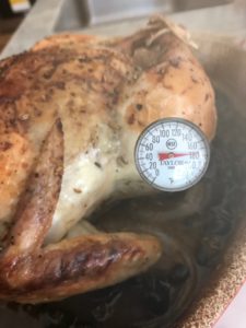 chicken with a meat thermometer in it