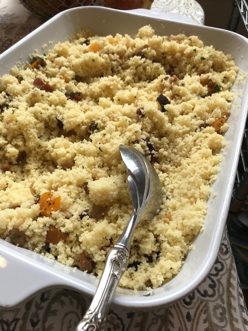 couscous with apricots and pine nuts in a serving dish