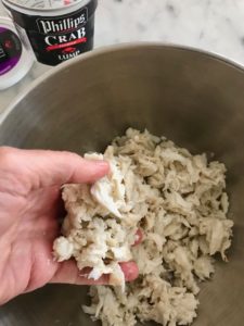 crab meat in a metal mixing bowl