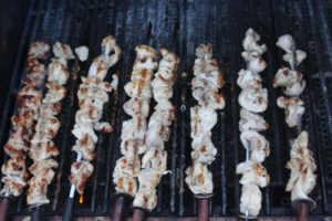 grilling the chicken skewers