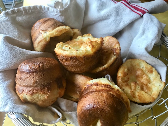 individual yorkshire pudding in a serving basket