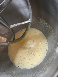 stand mixer with eggs beaten until frothy