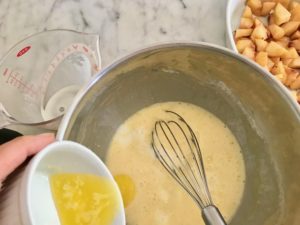 whisking in the melted butter