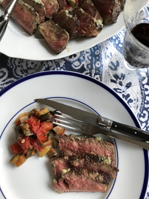 perfect grilled steak and ratatouille on a serving plate