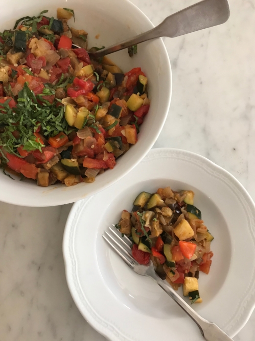 ratatouille in a serving bowl and serving plate