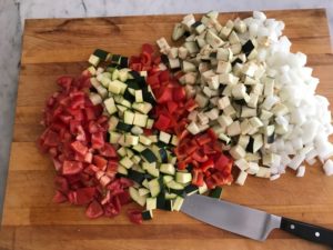 diced vegetables on a cutting board
