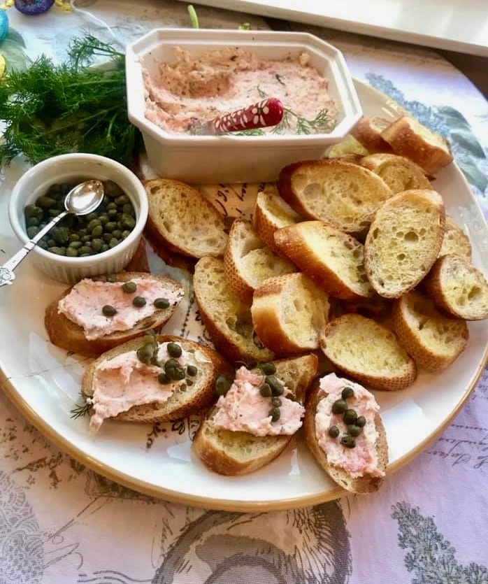 salmon pate with crostini on serving platter