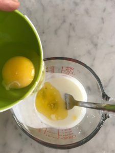 egg, buttermilk, and butter being combined