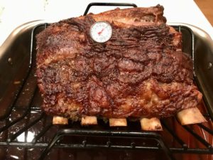 rib roast with thermometer in it