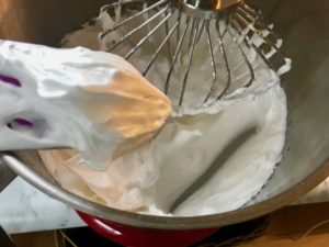 meringue mixture whipped to hard peaks