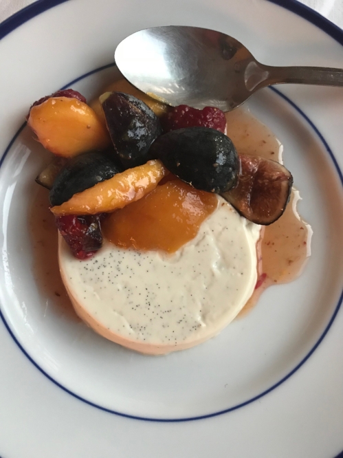 panna cotta with summer fruit on a serving plate