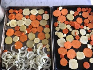 vegetables spread out on baking sheets