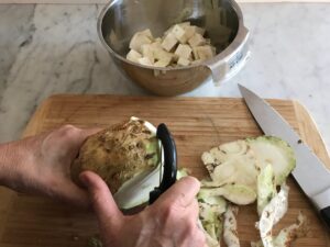 peeling and dicing the celery root