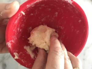 mixing the flour and the butter in a small bowl