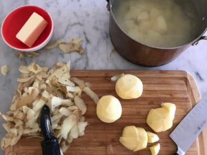 peeling the potatoes