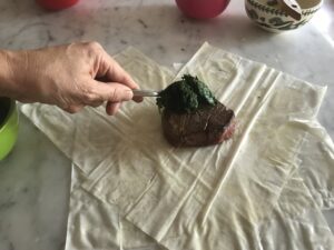 putting the filet and spinach in the filo