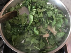 adding the spinach