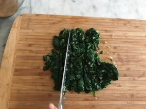 chopping the spinach