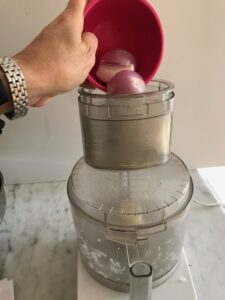 food processor with shallots and garlic