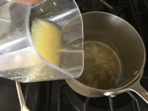 adding lemon juice to the sauce