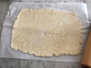 rolling out the pastry dough