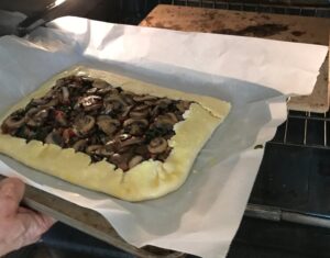 placing the galette in the oven