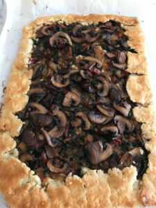 finished green and mushroom galette