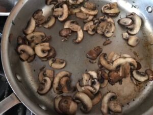 sauteing the mushrooms
