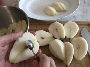 peeling and quartering the pears