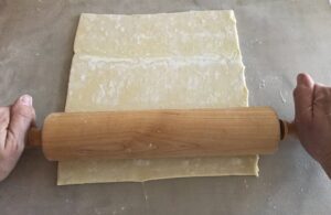 rolling out puff pastry