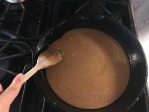 butter and sugar caramel mixture in a pan