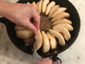 arranging the pears in a circular pattern