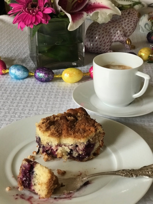 very berry crumble coffee cake on a serving plate